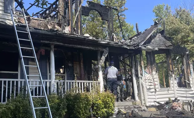 This image provided by the Office of the State Fire Marshal shows the aftermath of a house fire in Waldorf, Md., Sunday, Aug. 10, 2025. (Office of the State Fire Marshal via AP)