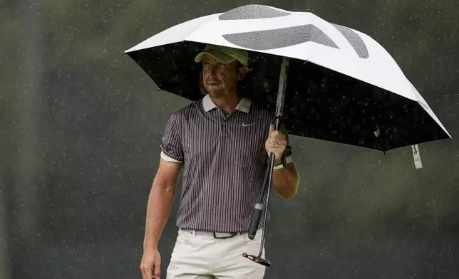 Tommy Fleetwood, of England, walks off the second green during the third round of the Tour Championship golf tournament, Saturday, Aug. 23, 2025, in Atlanta. (AP Photo/Mike Stewart)