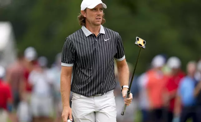 Tommy Fleetwood, of England, walks on the 17th green during the second round of the Tour Championship golf tournament, Friday, Aug. 22, 2025, in Atlanta. (AP Photo/Mike Stewart)