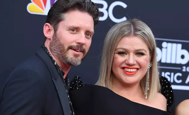 FILE - Brandon Blackstock, from left, Kelly Clarkson appear at the Billboard Music Awards on May 20, 2018, in Las Vegas. (Photo by Jordan Strauss/Invision/AP, File)