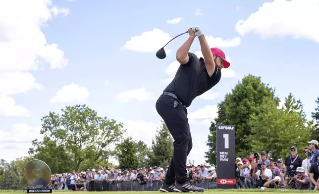 Tyrrell Hatton, of Legion XIII, hits from the first tee during the final round of LIV Golf Team Championship Michigan at The Cardinal at Saint John's, Sunday, Aug. 24, 2025, in Plymouth, Mich. (Pedro Salado/LIV Golf via AP)