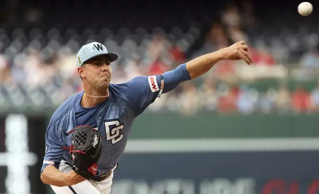 Washington Nationals pitcher MacKenzie Gore throws during the first inning of a baseball game against the Philadelphia Phillies, Friday, Aug. 15, 2025, in Washington. (AP Photo/Daniel Kucin Jr.)