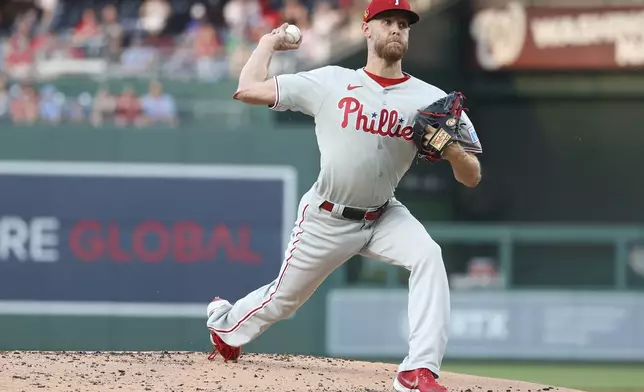 Philadelphia Phillies pitcher Zack Wheeler throws during the first inning of a baseball game against the Washington Nationals, Friday, Aug. 15, 2025, in Washington. (AP Photo/Daniel Kucin Jr.)
