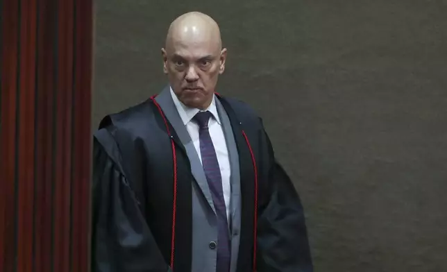 FILE - President of the Supreme Electoral Court, Minister Alexandre de Moraes arrives to preside over the trial of former President Jair Bolsonaro in Brasilia, Brazil, June 29, 2023. (AP Photo/Gustavo Moreno, File)