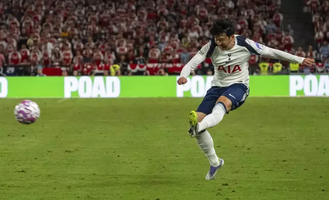 Tottenham Hotspur's Son Heung-min plays the ball during the first North London Derby played outside the United Kingdom between Arsenal FC and Tottenham Hotspur, Thursday, July 31, 2025, at the Hong Kong Football Festival held at the Kai Tak Stadium in Hong Kong. (AP Photo/Chan Long Hei)
