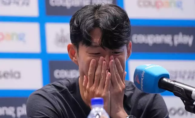 Tottenham Hotspur's Son Heung-min reacts during a press conference ahead of a preseason soccer match between Tottenham Hotspur and Newcastle United in Seoul, South Korea, Saturday, Aug. 2, 2025. (AP Photo/Ahn Young-joon)