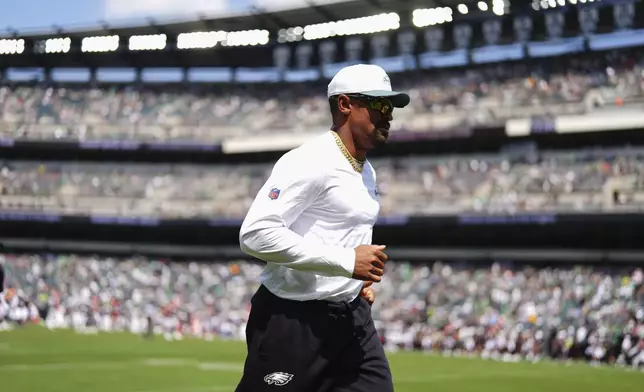 Philadelphia Eagles quarterback Jalen Hurts runs off the field during halftime of an NFL preseason football game against the Cleveland Browns on Saturday, Aug. 16, 2025, in Philadelphia. (AP Photo/Derik Hamilton)