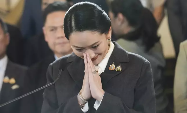 Thailand's suspended Prime Minister Paetongtarn Shinawatra gestures during a press conference after her dismissal, in Bangkok, Thailand, Friday, Aug. 29, 2025. (AP Photo/Sakchai Lalit)