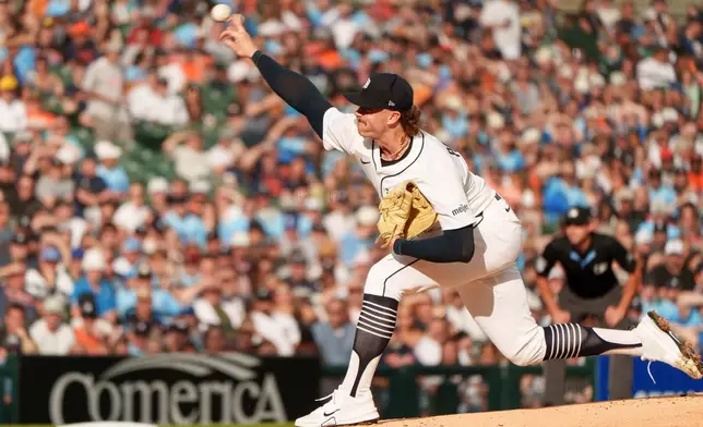 Detroit Tigers pitcher Chris Paddack throws against the Kansas City Royals during the first inning of a baseball game Saturday, Aug. 23, 2025, in Detroit. (AP Photo/Josh Boland )