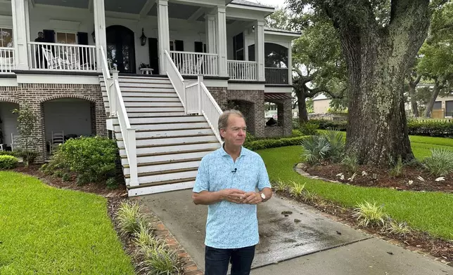 Overlooking the Mississippi Sound, former Gulfport Mayor Billy Hewes stands in front of his home Aug. 12, 2025, in Gulfport, Miss. (AP Photo/Jeff Amy)