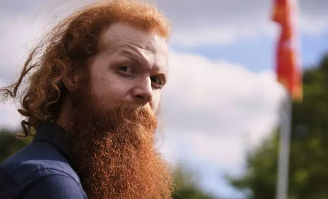 A participant attends the Red Head Days festival in Tilburg, Netherlands, Saturday, Aug. 30, 2025. (AP Photo/Virginia Mayo)