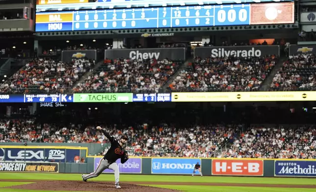 Baltimore Orioles starting pitcher Brandon Young throws during the eighth inning of a baseball game against the Houston Astros in Houston, Friday, Aug. 15, 2025. (AP Photo/Ashley Landis)