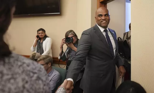 FILE - Colin Allred, right, attends a public hearing on congressional redistricting at the Texas Capitol in Austin, Texas, Aug. 1, 2025. (AP Photo/Eric Gay, File)