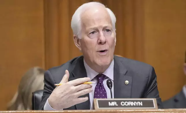 FILE - Sen. John Cornyn, R-Texas questions U.S. Trade Representative Jamieson Greer as he testifies before the Senate Finance Committee on Capitol Hill in Washington, April 8, 2025. (AP Photo/Mark Schiefelbein, File)