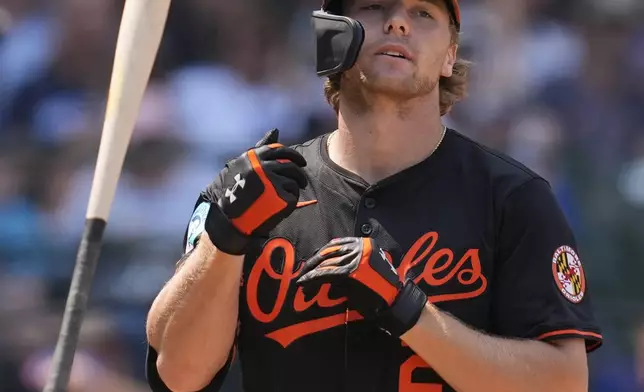 Baltimore Orioles' Gunnar Henderson (2) flips his bat after striking out against Chicago Cubs pitcher Caleb Thielbar during the sixth inning of a baseball game Friday, Aug. 1, 2025, in Chicago. (AP Photo/Erin Hooley)