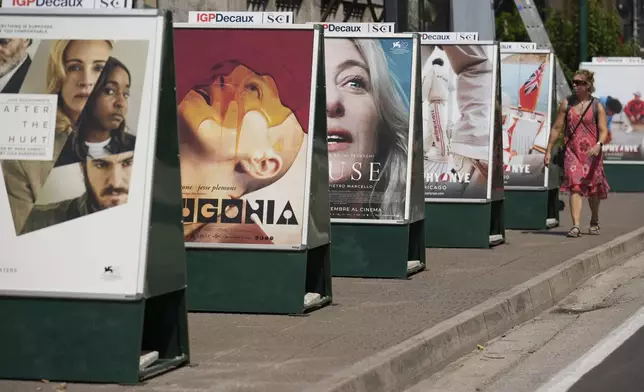 Film posters outside the Excelsior hotel ahead of the Venice Film Festival in Venice, Italy, on Tuesday, Aug. 26, 2025. (Photo by Alessandra Tarantino/Invision/AP)