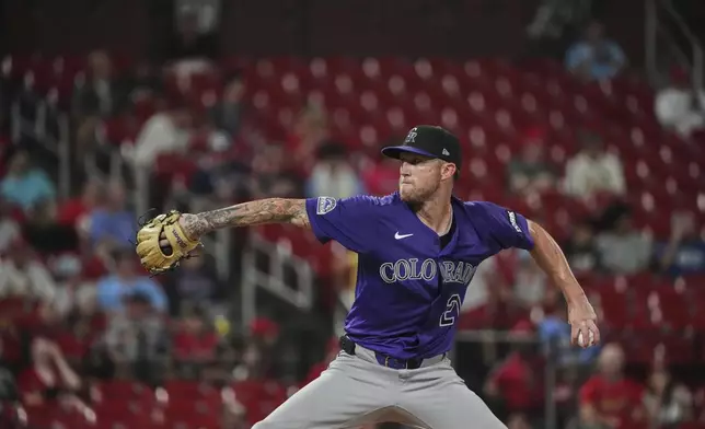 Colorado Rockies starting pitcher Kyle Freeland throws during the seventh inning of a baseball game against the St. Louis Cardinals Tuesday, Aug. 12, 2025, in St. Louis. (AP Photo/Jeff Roberson)