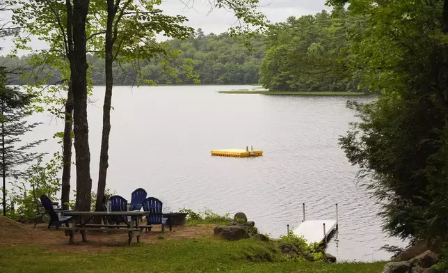 FILE - Crawford Pond is seen Wednesday, July 9, 2025, in Union, Maine, as police investigate the murder of a woman last seen paddleboarding on the pond. (AP Photo/Robert F. Bukaty, File)