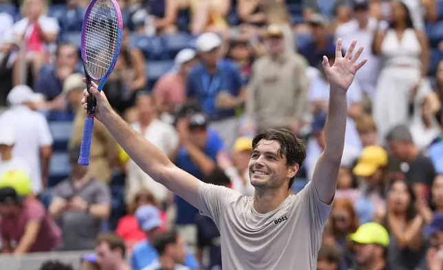 Taylor Fritz, of the United States, reacts after defeating Emilio Nava, of the United States, during the first round of the US Open tennis championships, Sunday, Aug. 24, 2025, in New York. (AP Photo/Yuki Iwamura)