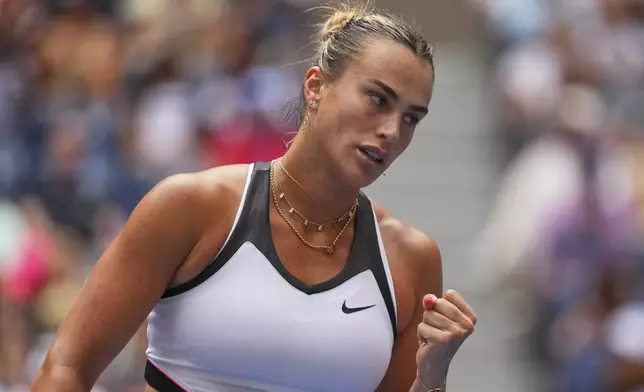 Aryna Sabalenka, of Belarus, reacts after scoring a point against Rebeka Masarova, of Switzerland, during the first round of the US Open tennis championships, Sunday, Aug. 24, 2025, in New York. (AP Photo/Kirsty Wigglesworth)
