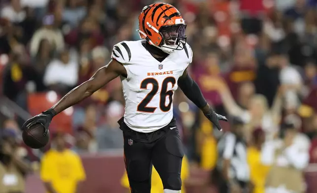 Cincinnati Bengals safety Tycen Anderson celebrates after intercepting a pass during the first half of a preseason NFL football game against the Washington Commanders Monday, Aug. 18, 2025, in Landover, Md. (AP Photo/Stephanie Scarbrough)