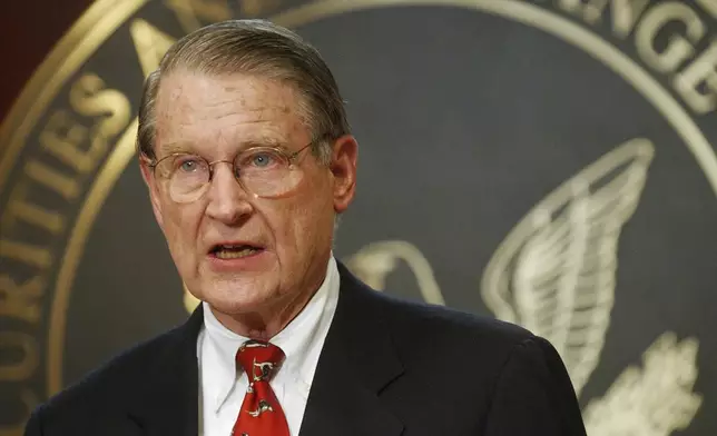 FILE - Former FBI and CIA head William H. Webster speaks to reporters in Washington, Oct. 25, 2002. (AP Photo/Lawrence Jackson, File)