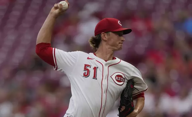 Cincinnati Reds pitcher Brady Singer throws during the first inning of a baseball game against the Philadelphia PhilliesTuesday, Aug. 12, 2025, in Cincinnati. (AP Photo/Carolyn Kaster)