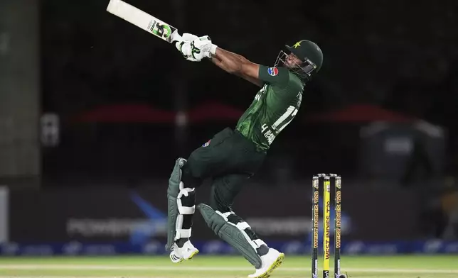 Pakistan's Hasan Nawaz hits a six during the third Twenty20 cricket match against the West Indies, Sunday, Aug. 3, 2025, in Lauderhill, Fla. (AP Photo/Lynne Sladky)