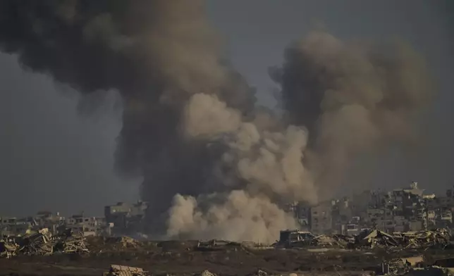 Smoke rises to the sky following an Israeli military strike in the northern Gaza Strip, as seen from southern Israel, Saturday, Aug. 30, 2025. (AP Photo/Leo Correa)