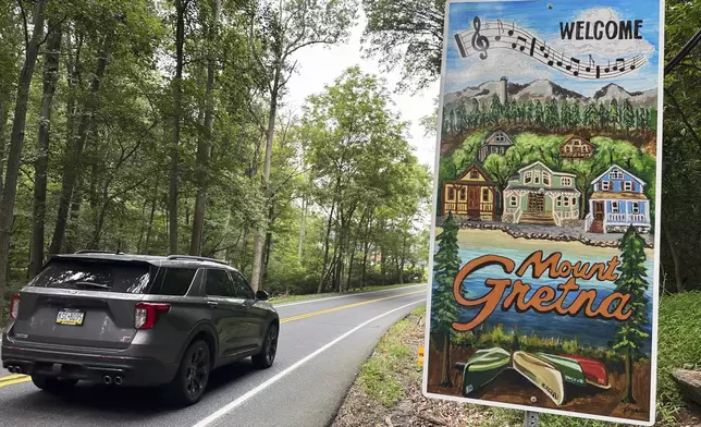 A sign on Pinch Road, shown Wednesday, Aug. 6, 2025, welcomes motorists to the town of Mount Gretna, Pa. (AP Photo/Mark Scolforo)