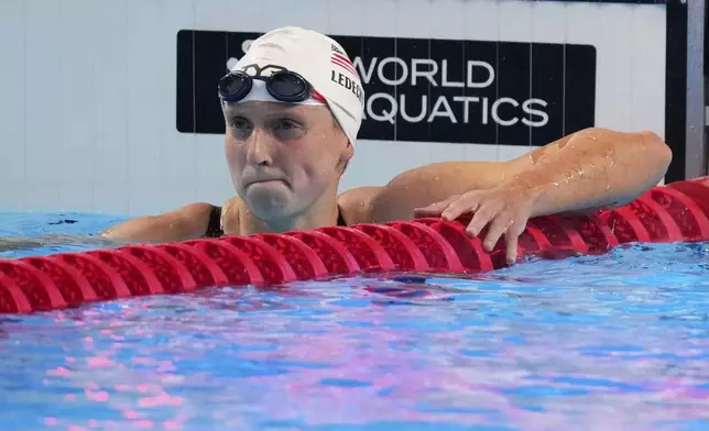 Katie Ledecky of the United States reacts after competing in the women's 800-meter freestyle heats at the World Aquatics Championships in Singapore, Friday, Aug.1, 2025. (AP Photo/Vincent Thian)