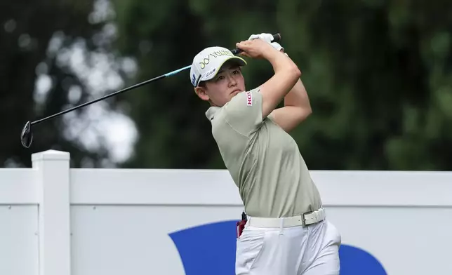 Akie Iwai, of Japan, hits off the 15th tee during the first round of the LPGA Portland Classic golf tournament at Columbia Edgewater in Portland, Ore., Thursday, Aug. 14, 2025. (AP Photo/Ali Gradischer)