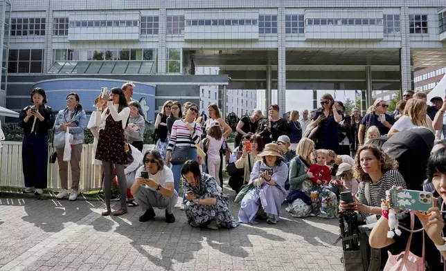 Finland Moomins Fans celebrate the 80th anniversary of the publication of the Finnish children's classic, "The Moomins and The Great Flood," and the birthday of the author Tove Jansson, in Tampere, Finland, Saturday, Aug. 9, 2025. (AP Photo/Tommi Ojala)
