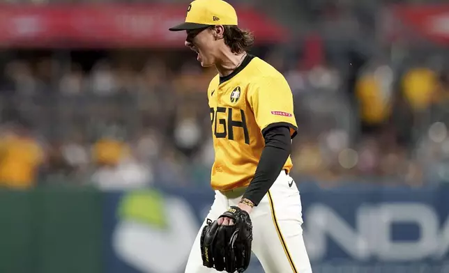Pittsburgh Pirates pitcher Bubba Chandler reacts after getting Colorado Rockies' Mickey Moniak to strike out to end the sixth inning of a baseball game Friday, Aug. 22, 2025, in Pittsburgh. (AP Photo/Matt Freed)