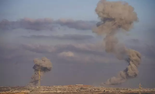 Smokes rise to the sky following Israeli military strikes in the northern Gaza Strip, as seen from southern Israel, Sunday, Aug. 31, 2025. (AP Photo/Maya Levin)