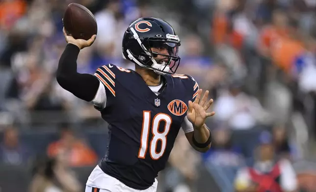 Chicago Bears quarterback Caleb Williams (18) throws a pass in the first half of a preseason NFL football game against the Buffalo Bills Sunday, Aug. 17, 2025, in Chicago. (AP Photo/Paul Beaty)