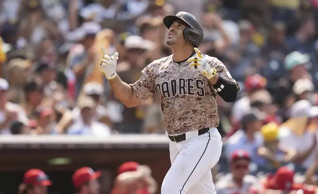 San Diego Padres' Ramon Laureano celebrates his home run during the eighth inning of a baseball game against the St. Louis Cardinals Sunday, Aug. 3, 2025, in San Diego. (AP Photo/Gregory Bull)