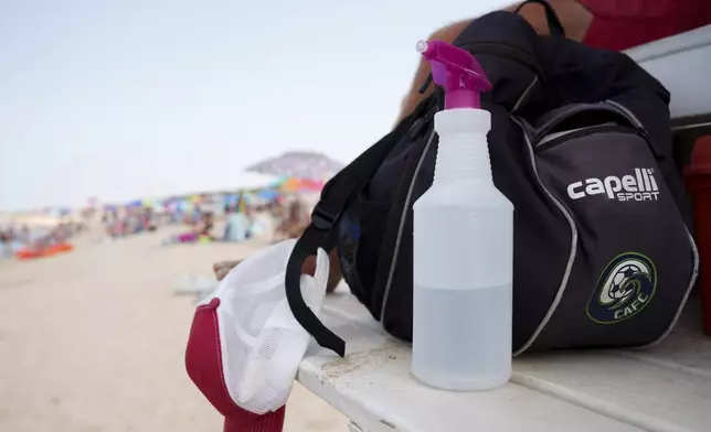 A vinegar-based solution, for the treatment of jellyfish stings, at a Lewes Beach Patrol lifeguard station at Savannah Beach, in Lewes, Del., on Wednesday, July 30, 2025. (AP Photo/Mingson Lau)