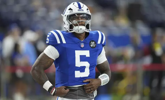 Indianapolis Colts quarterback Anthony Richardson Sr. warms up before a preseason NFL football game against the Green Bay Packers, Saturday, Aug. 16, 2025, in Indianapolis. (AP Photo/AJ Mast)