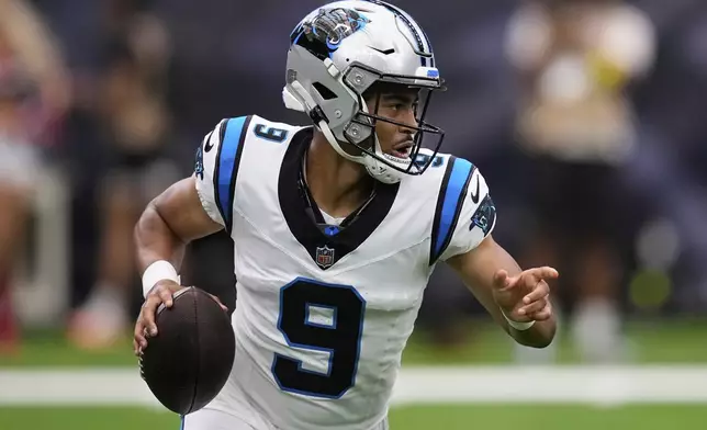 Carolina Panthers quarterback Bryce Young looks to pass against the Houston Texans during the first half of an NFL preseason football game on Saturday, Aug. 16, 2025, in Houston. (AP Photo/David J. Phillip)