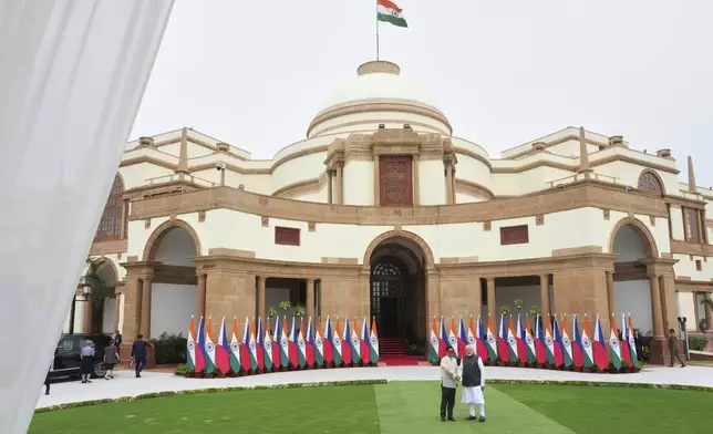 Indian Prime Minister Narendra Modi, right, shakes hand with Philippines President Ferdinand Marcos Jr. before their delegation level talks in New Delhi, India, Tuesday, Aug. 5, 2025. (AP Photo/Manish Swarup)