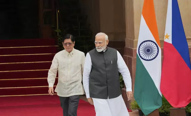 Indian Prime Minister Narendra Modi, right, with Philippines President Ferdinand Marcos Jr. before delegation level talks in New Delhi, India, Tuesday, Aug. 5, 2025. (AP Photo/Manish Swarup)