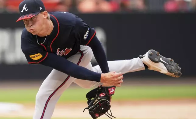 Atlanta Braves pitcher Hurston Waldrep throws against the Cincinnati Reds during the second inning of the MLB Speedway Classic baseball game at Bristol Motor Speedway in Bristol, Tenn., Sunday, Aug. 3, 2025. Play was resumed today after yesterday's weather delay. (AP Photo/George Walker IV)