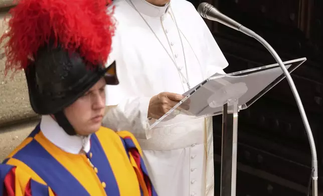 Pope Leo XIV delivers the Angelus prayer, in Castel Gandolfo, in the outskirts of Rome, Friday, Aug.15, 2025. (AP Photo/Gregorio Borgia)