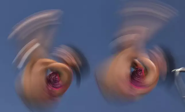 Gabriela Agundez Garcia and Alejandra Estudillo Torres, of Mexico, compete in the women's 10m synchronized preliminaries at the World Aquatics Championships in Singapore, July 28, 2025. (AP Photo/Ng Han Guan)