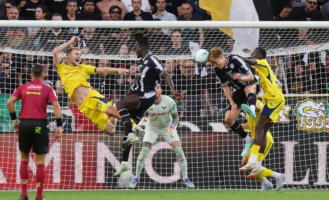 Udinese's Thomas Kristensen celebrates after scoring their side's first goal of the game during the Italian Serie A soccer match between Udinese and Hellas Verona at the Bluenergy Stadium in Udine, Italy, Monday, Aug. 25, 2025. (Andrea Bressanutti/LaPresse via AP)