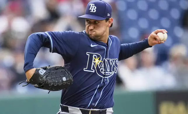 Tampa Bay Rays' Ian Seymour pitches in the first inning of a baseball game against the Cleveland Guardians in Cleveland, Monday, Aug. 25, 2025. (AP Photo/Sue Ogrocki)