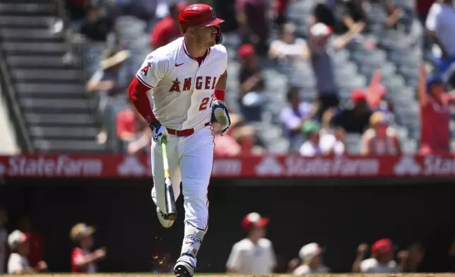 Los Angeles Angels' Mike Trout runs after hitting a home run during the third inning of a baseball game against the Tampa Bay Rays Wednesday, Aug. 6, 2025, in Anaheim, Calif. (AP Photo/William Liang)