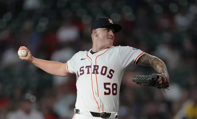 Houston Astros starting pitcher Hunter Brown throws against the Boston Red Sox during the first inning of a baseball game Wednesday, Aug. 13, 2025, in Houston. (AP Photo/David J. Phillip)