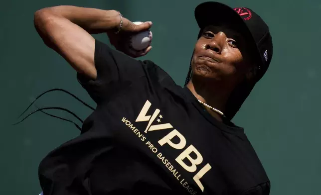 Mo'ne Davis throws during the first day of tryouts for the Women's Professional Baseball League, Friday, Aug 22, 2025, at the Washington Nationals Youth Baseball Academy in Washington. (AP Photo/Julia Demaree Nikhinson)